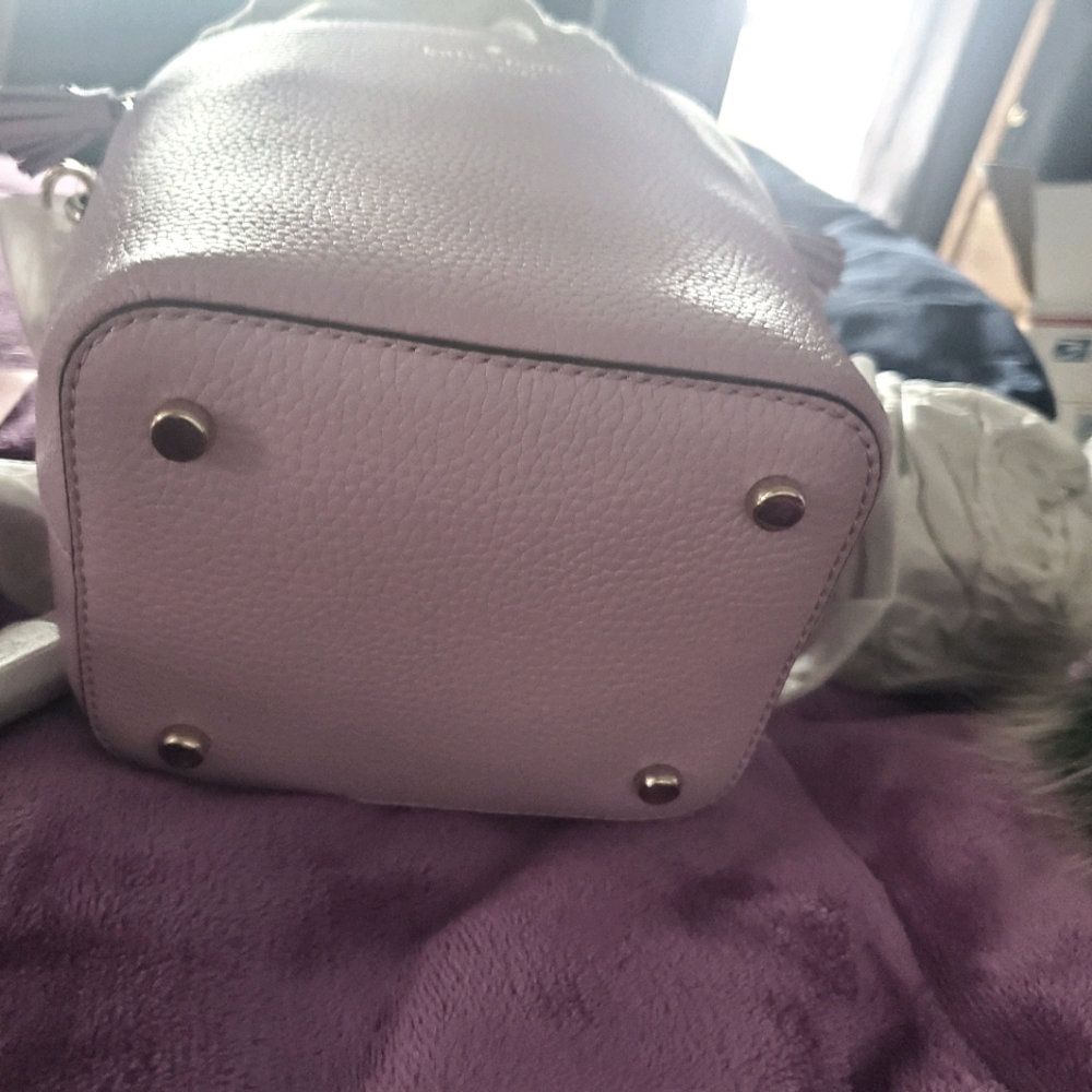 This is a new Kate Spade with tags
